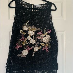 Jennifer Lopez, size large, embroidered top